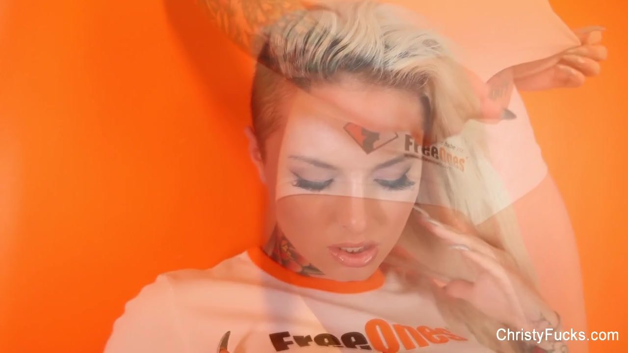 Cute Christy teases in her FreeOnes shirt